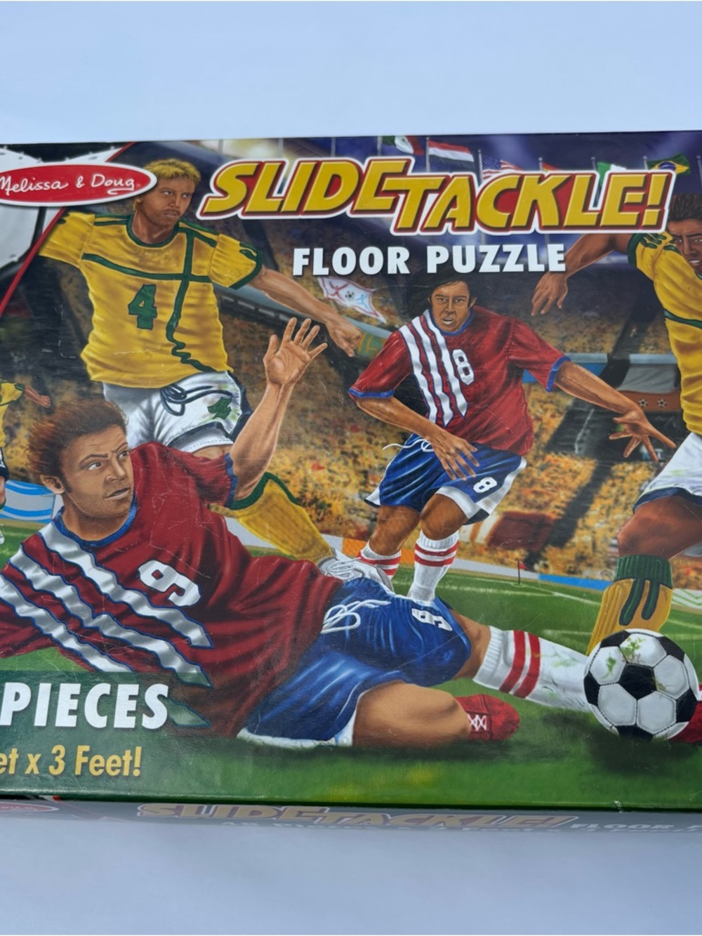 Melissa & Doug Soccer Slide Tackle Floor Puzzle - Red, Yellow, Blue, Green